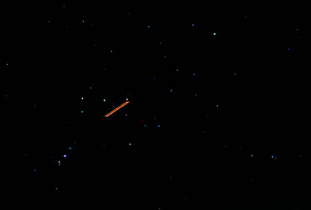 Flugzeug im Sternbild Orion
